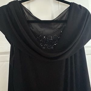 Very pretty black dress with detail at chest